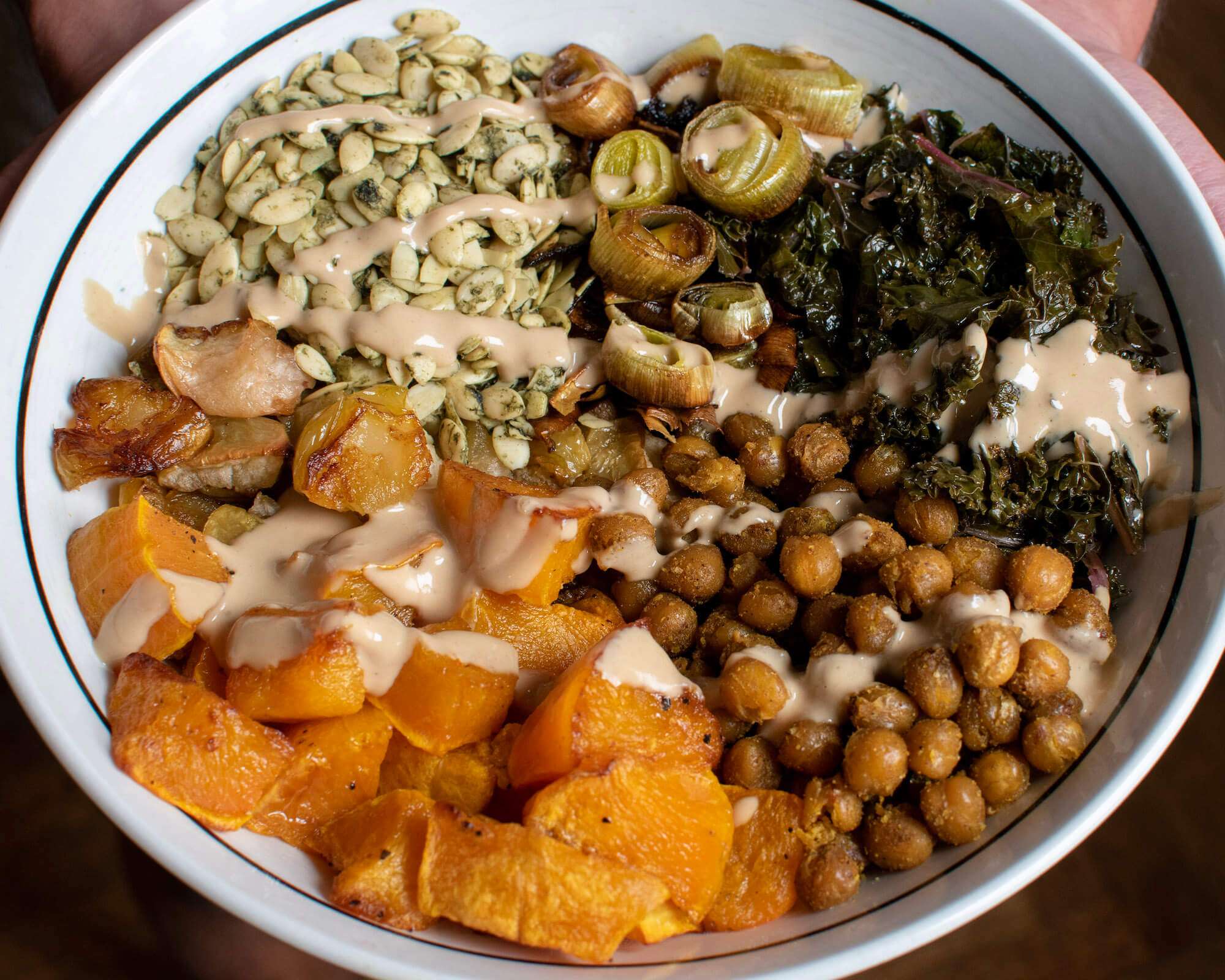 Harvest Bowl with Butternut Squash and Crispy Curry Spice Chickpeas and Go Raw Sprouted Pumpkin Seeds
