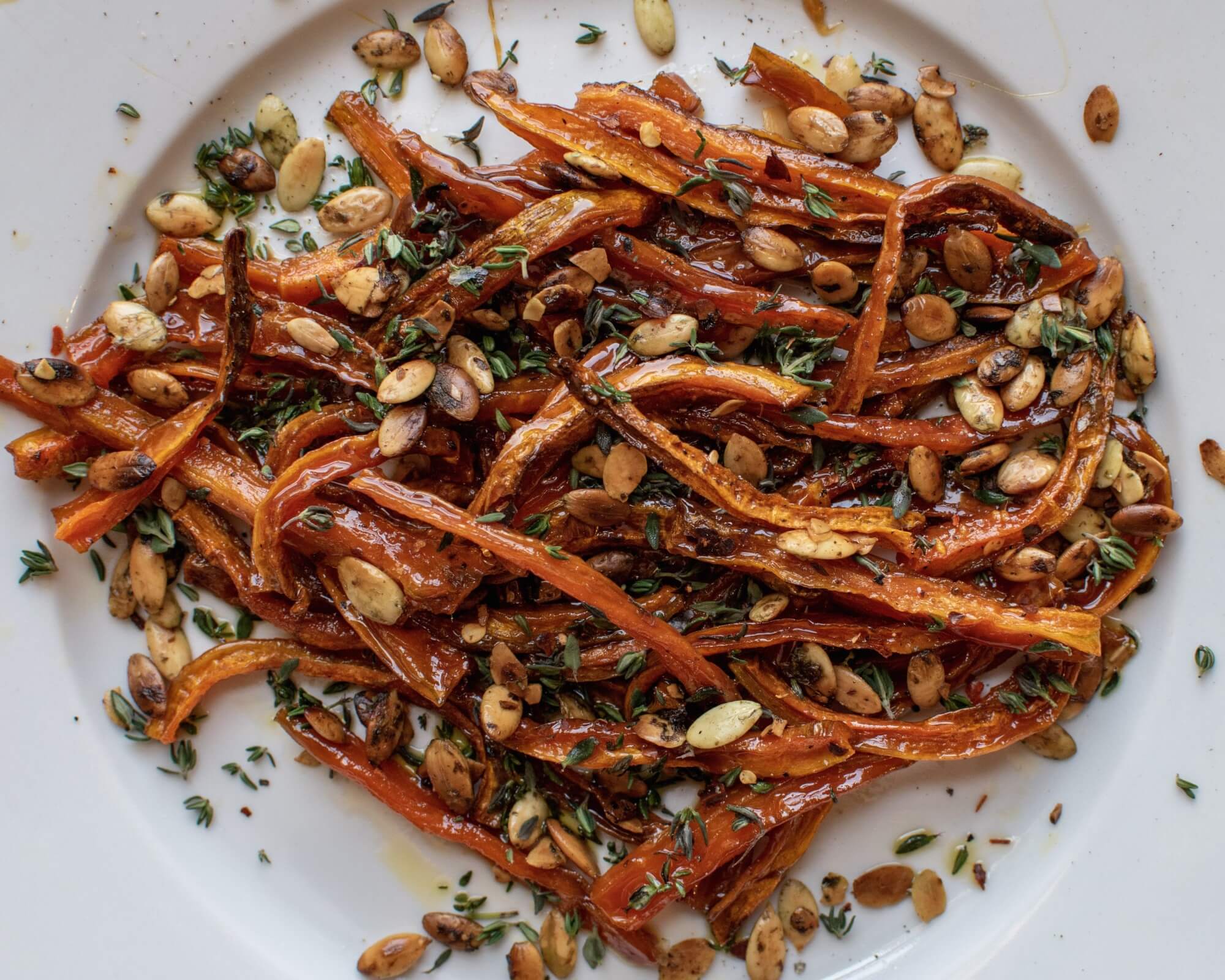 Maple Glazed Carrot Sticks with Go Raw Pumpkin Seeds